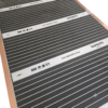Lattialämmityskalvo Infraheat 90 W/m² asennettuna puulattian koolausväliin rakennuskohteessa